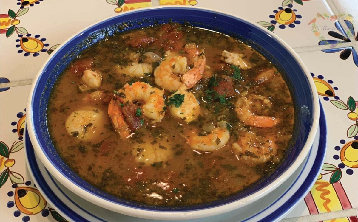 Italian fish stew called Cioppino in a bowl on the table.