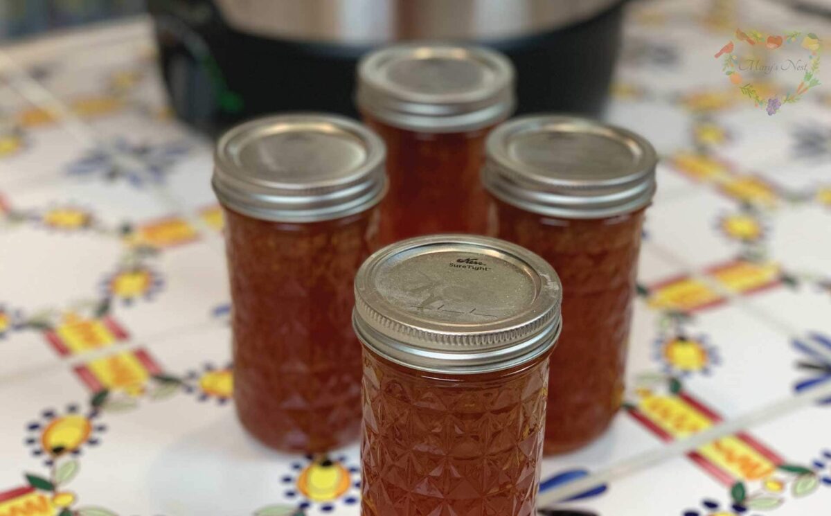 Three Citrus Marmalade Canned jars in the kitchen.