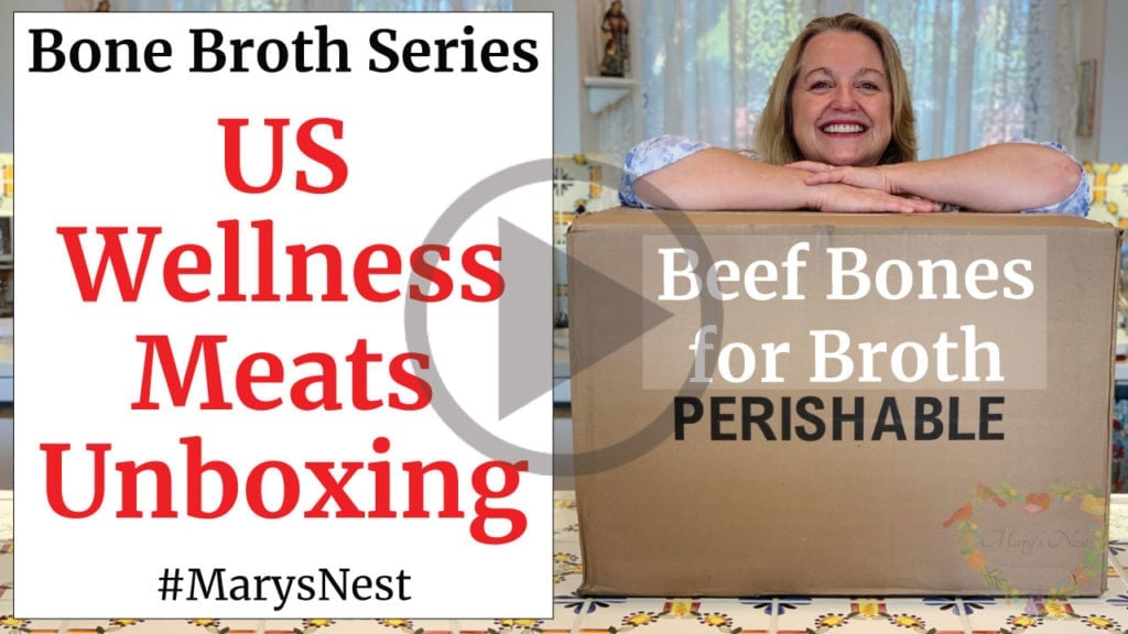 Mary with a US Wellness Meats shipping box.