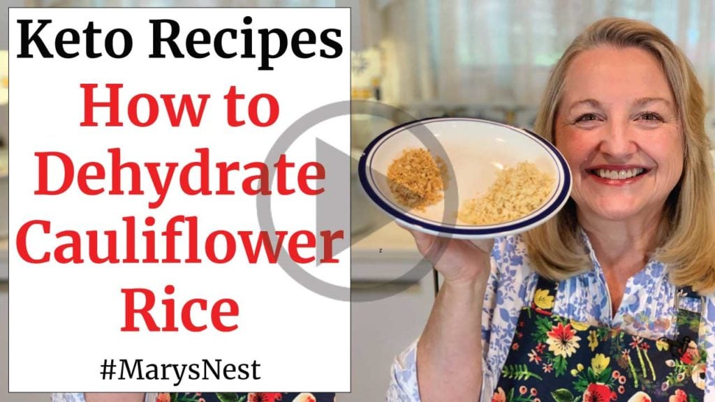 Mary holding a plate of Dehydrated Cauliflower Rice.