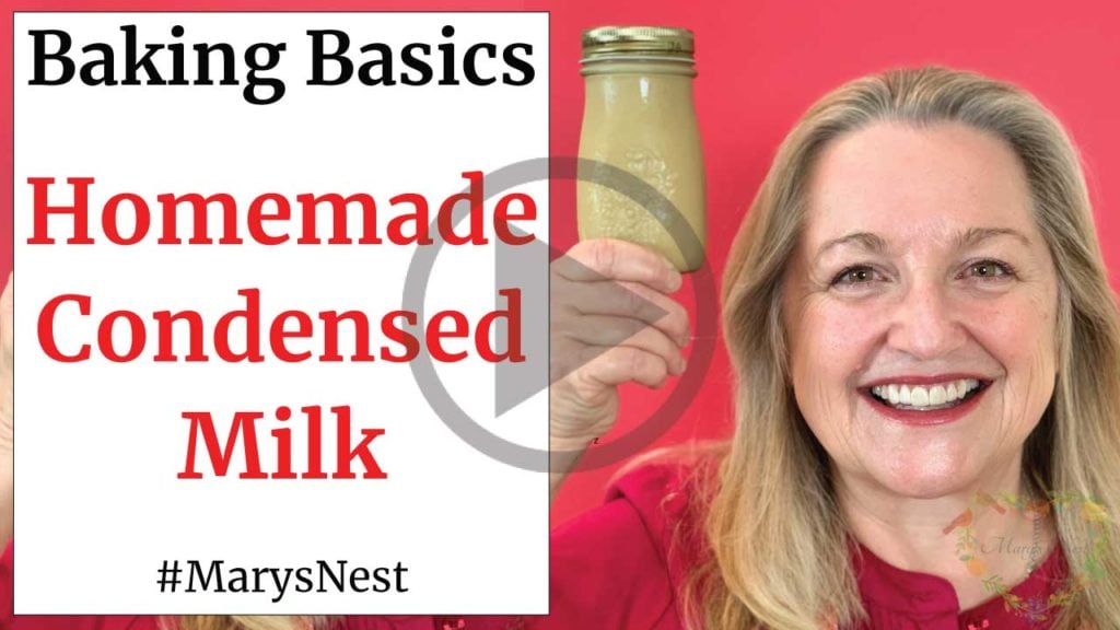 Mary holding a bottle of condensed milk.