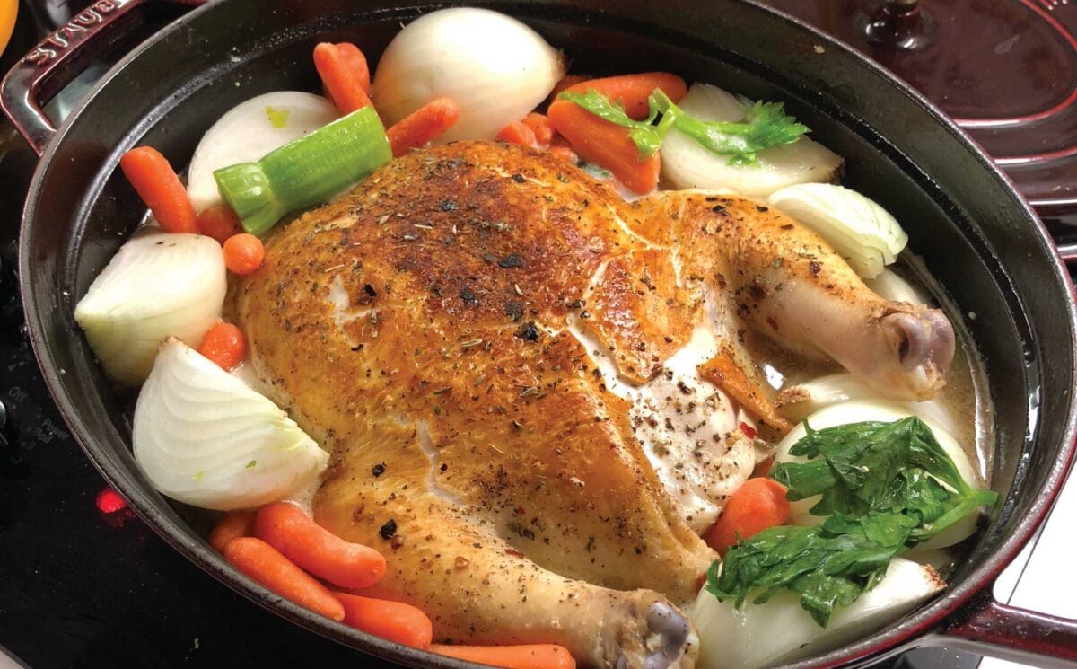 Praised Chicken in an oval dutch oven.