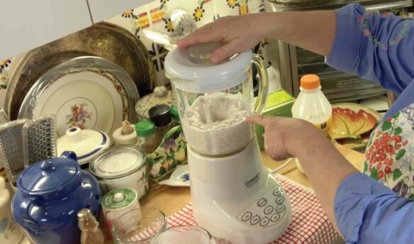 Making the blender pancake batter on a kitchen counter.