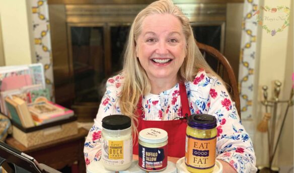 Mary with jars of ghee, tallow, and duck fat.