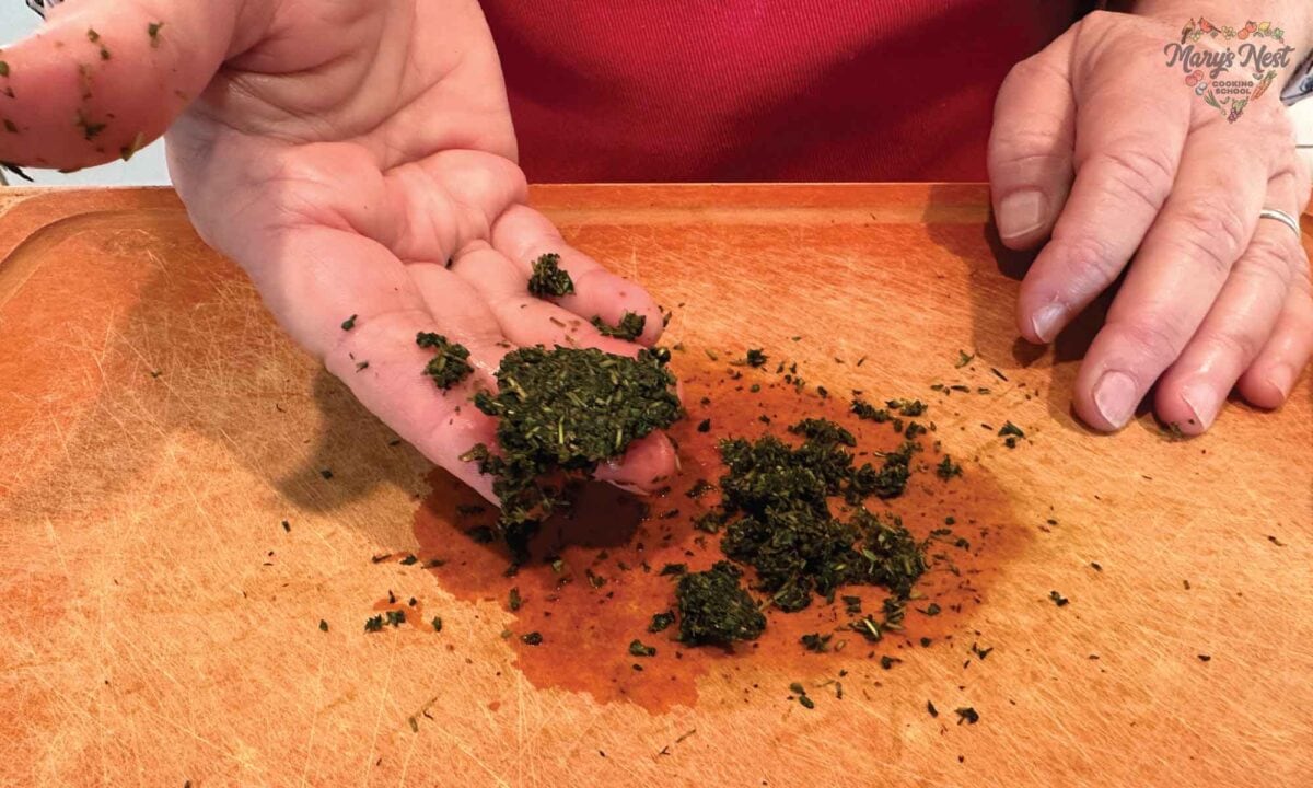 Fresh Thyme finely chopped in hand