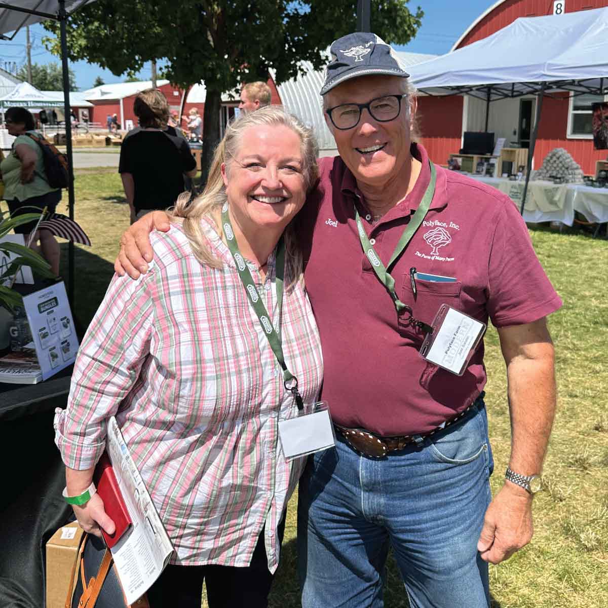 Mary Bryant Shrader with Joel Salatin at the Modern Homesteading Conference