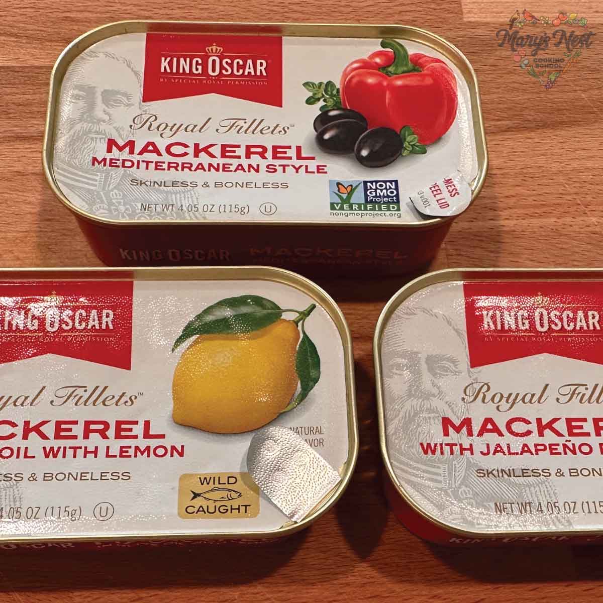 Showing three types of King Oscar Mackerel tins