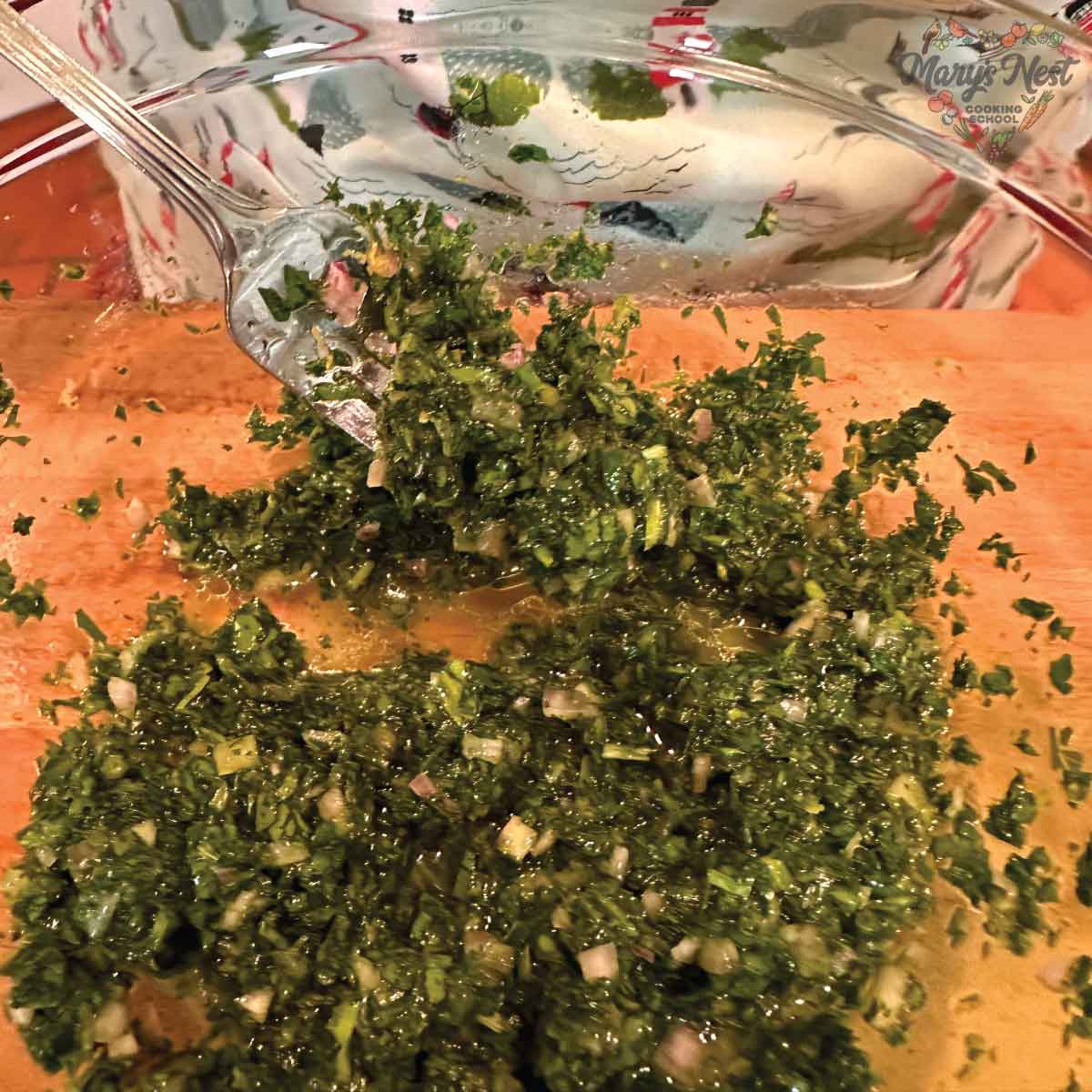 Showing Parsley Mixture for Kippers in glass bowl and on fork.