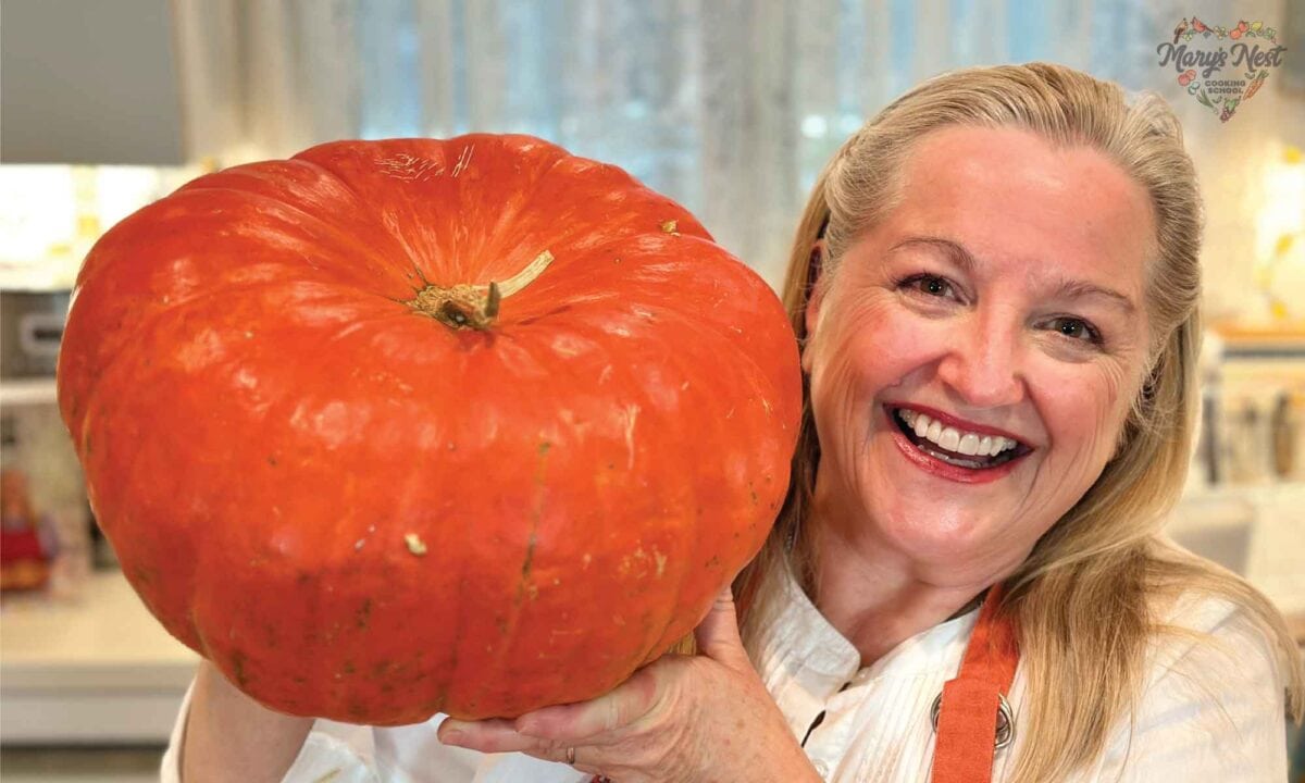 Mary holding a pumpkin.